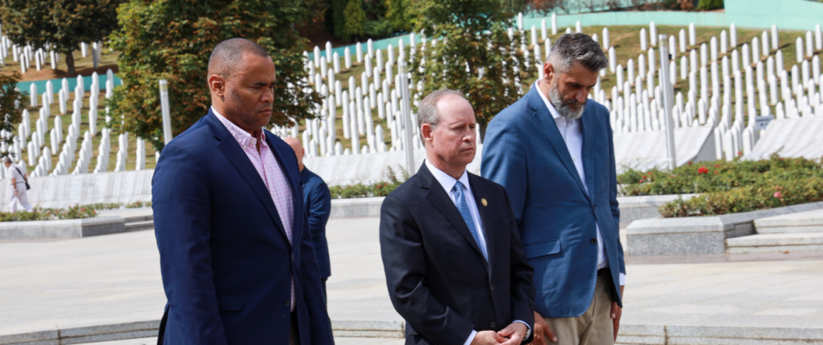 Representatives Murphy, Veasey, and the director of the Srebrenica Memorial Center lay a wreath at a memorial for victims of the Srebrenica genocide