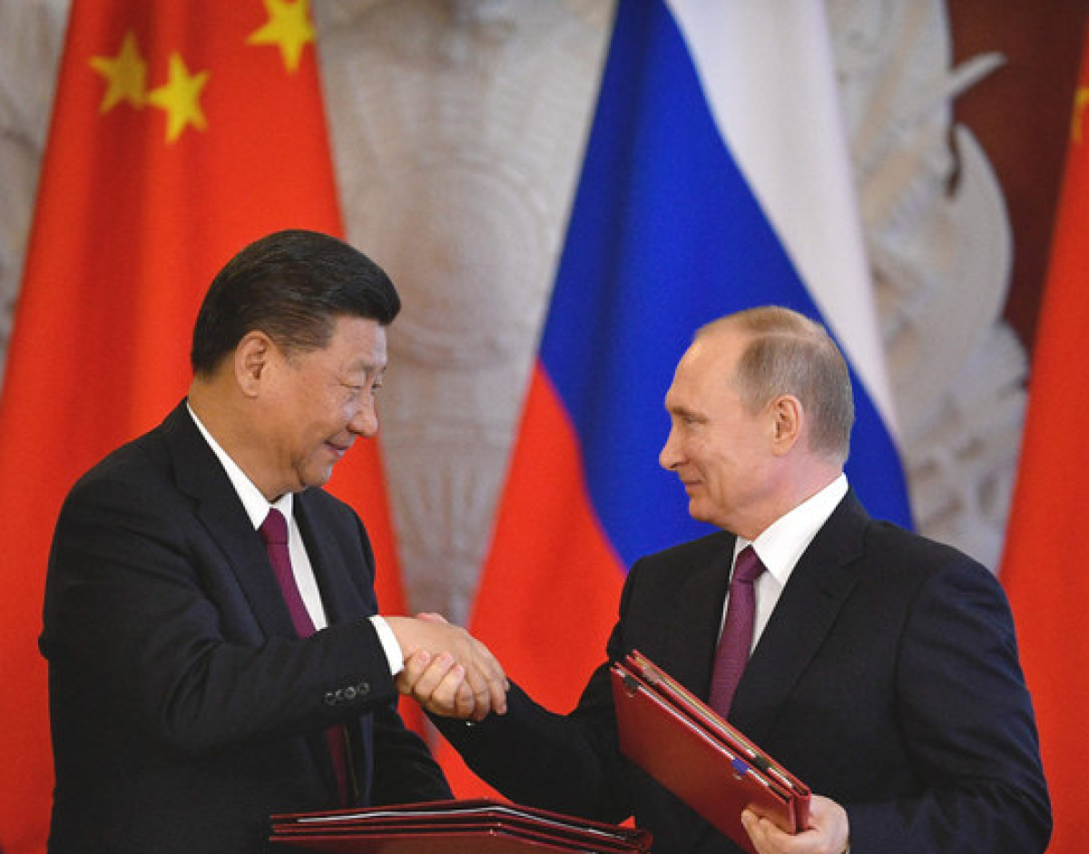 Xi Putin hail ties as stabilizing force in chaotic world _ Arab News e 