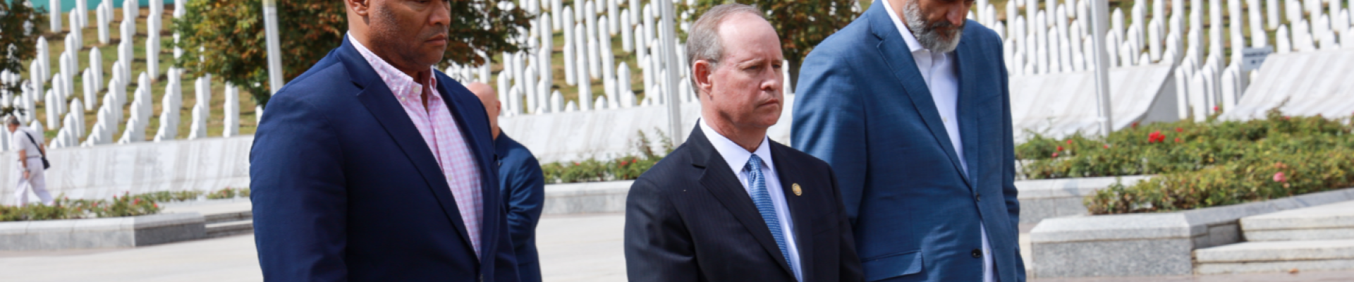 Representatives Murphy, Veasey, and the director of the Srebrenica Memorial Center lay a wreath at a memorial for victims of the Srebrenica genocide