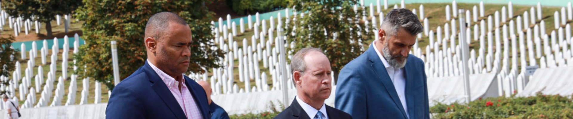 Representatives Murphy, Veasey, and the director of the Srebrenica Memorial Center lay a wreath at a memorial for victims of the Srebrenica genocide