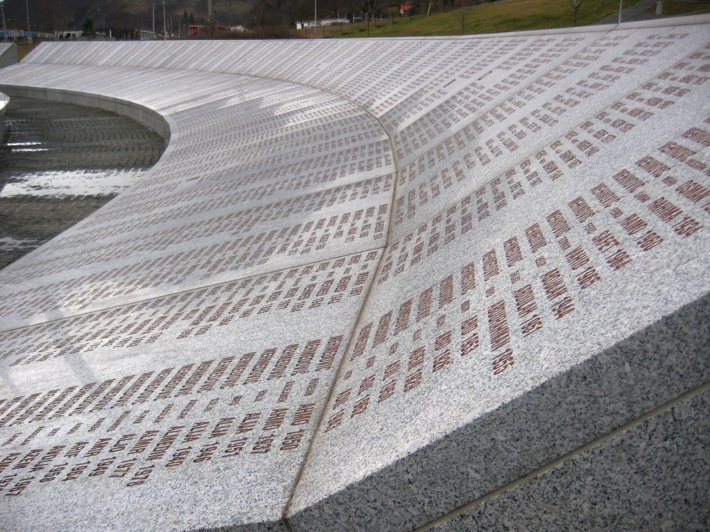Srebrenica massacre memorial wall of names. Credit: Michael Bueker