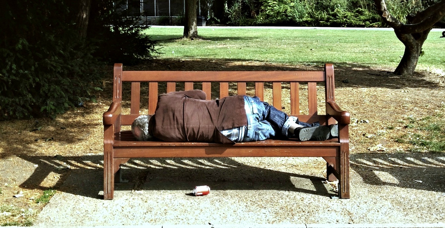 Homeless man on bench